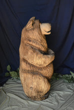 Load image into Gallery viewer, Chainsaw-carved wood sculptures, Nature-themed artworks, California Cedar creations, Artist Jess Alice, Trees, bears, fish, mushrooms, gnomes, raccoons, Wall hanging wood art, 3D free-standing sculptures, Lifelong enjoyment pieces, Unique rustic decor, Handmade, one-of-a-kind, Chainsaw artistry, Wildlife-inspired carvings, Home and garden art, Cedar artistry. Bear with fishing pole