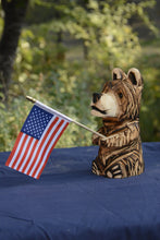 Load image into Gallery viewer, 10" Mini Flag-Bearing Marshmallow Bear: Handcrafted Chainsaw-Carved Cedar Sculpture with Interchangeable Flag | Chainsaw Artist Jess Alice