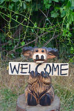 Load image into Gallery viewer, Mosse 16" Sitting While Holding Interchanable "Welcome" Sign Chainsaw Carving Sculpture | Raw California Cedar Wood Carved Artwork | Artist & Carver Jess Alice